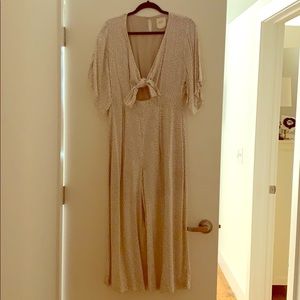 Culotte jumpsuit w/ polka dots. cutout with ties